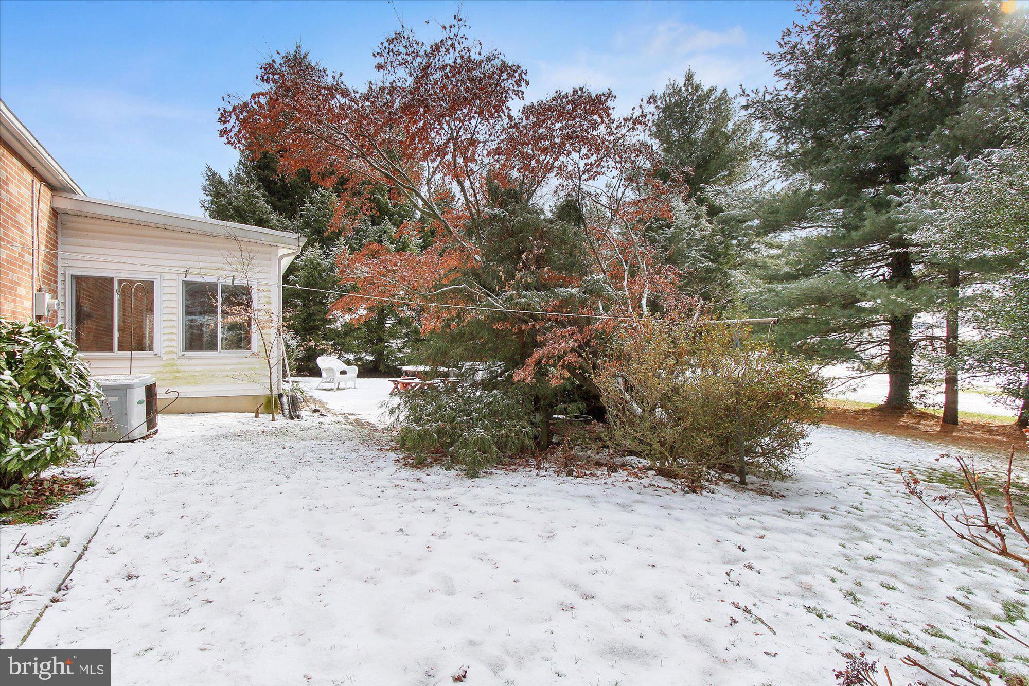 222 Dew Drop Road York, PA 17402 - Photo 26 of 31 a view of a yard covered in snow