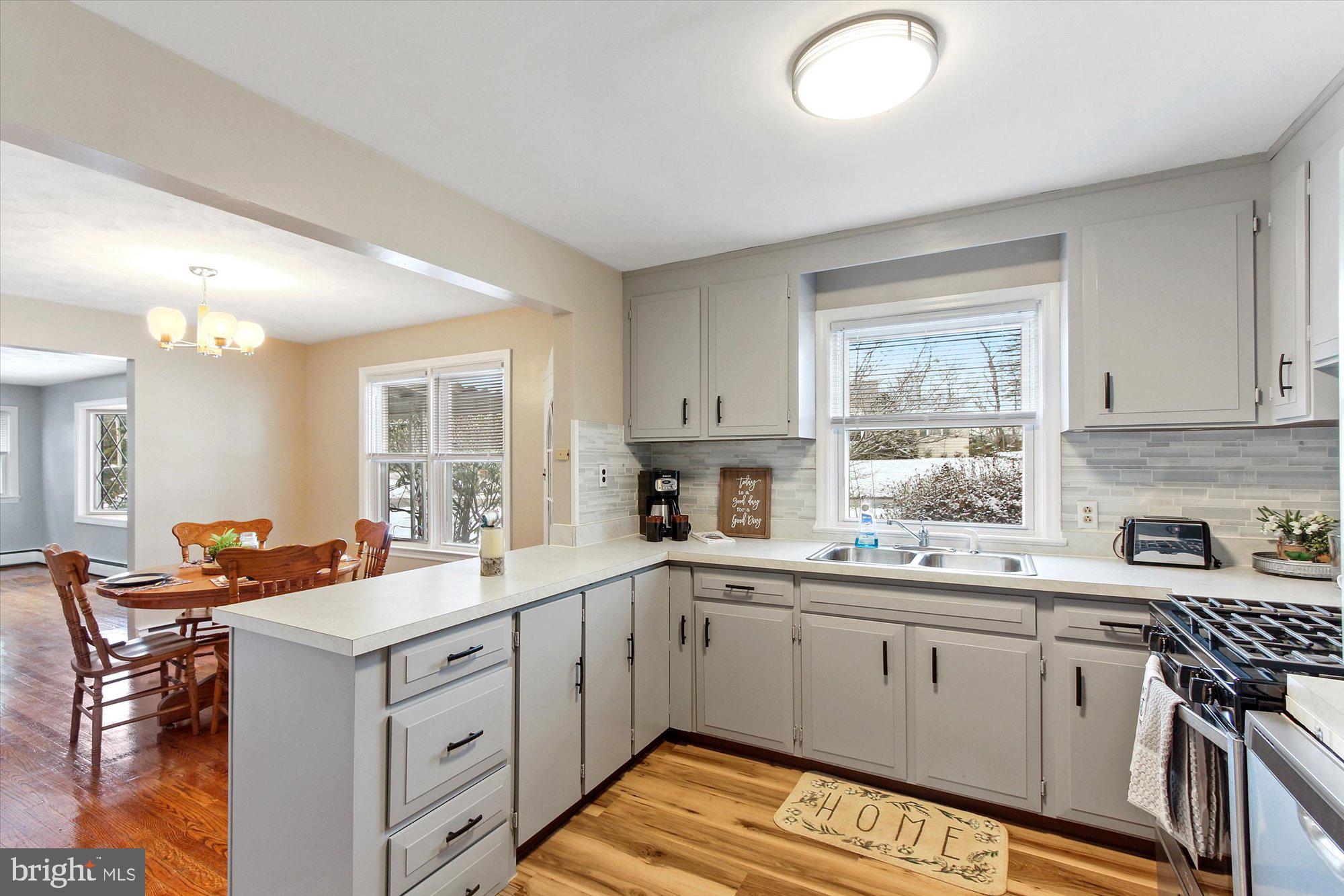 222 Dew Drop Road York, PA 17402 - Photo 9 of 31 a kitchen that has a sink and a stove in it