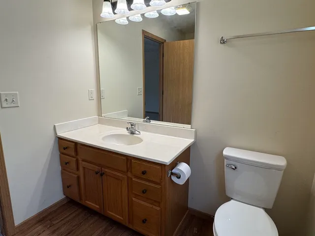 a bathroom with a glass shower door