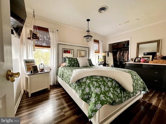 a bed room with a bed and a couch