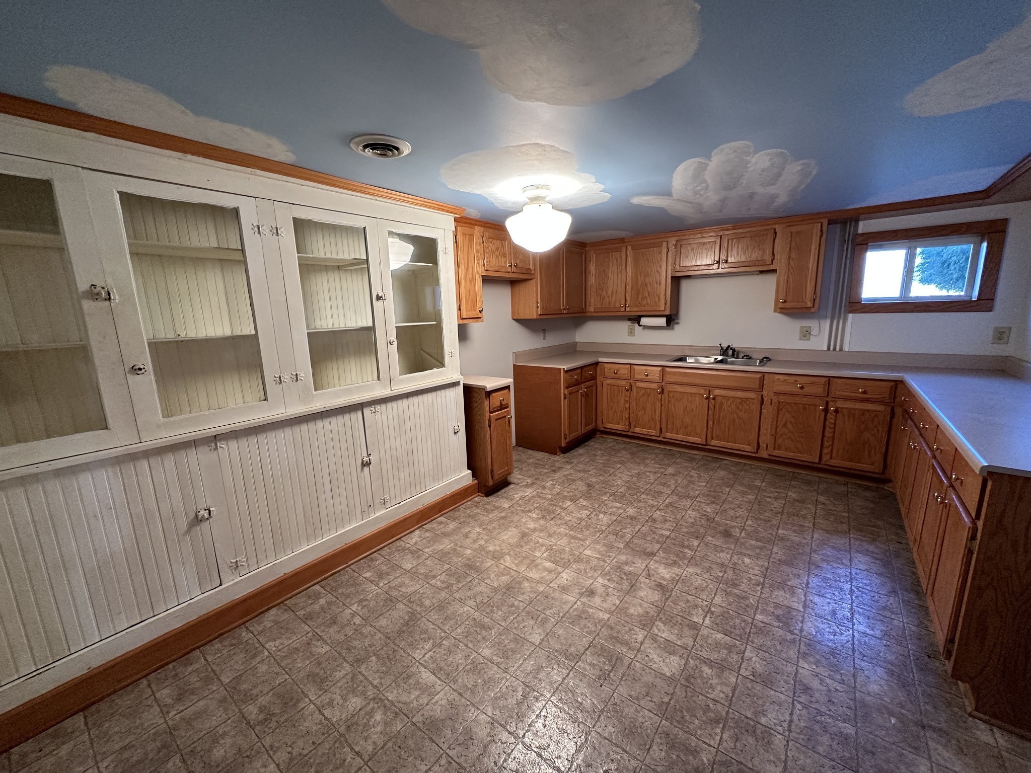732 Lancaster Highway Lancaster, TN 38569 - Photo 13 of 36 a large kitchen with granite countertop a large counter top space and stainless steel appliances