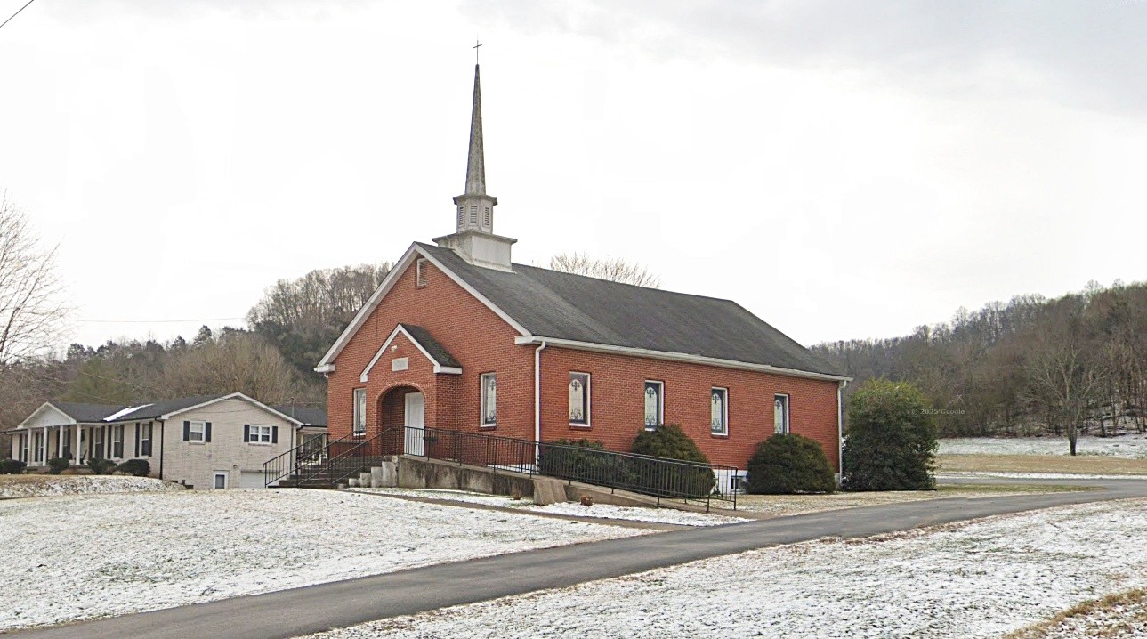 732 Lancaster Highway Lancaster, TN 38569 - Photo 2 of 36 a front view of a house with a yard