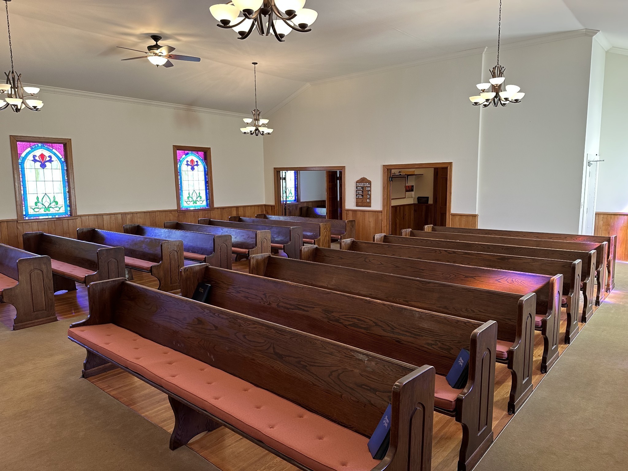 732 Lancaster Highway Lancaster, TN 38569 - Photo 24 of 36 a living room with lots of furniture and a chandelier