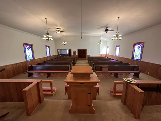 a room with furniture and pool table