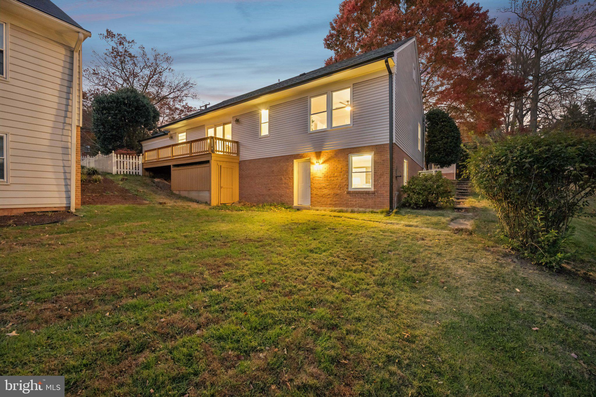 5144 Westpath Way Bethesda, MD 20816 - Photo 39 of 42 a view of a house with a yard