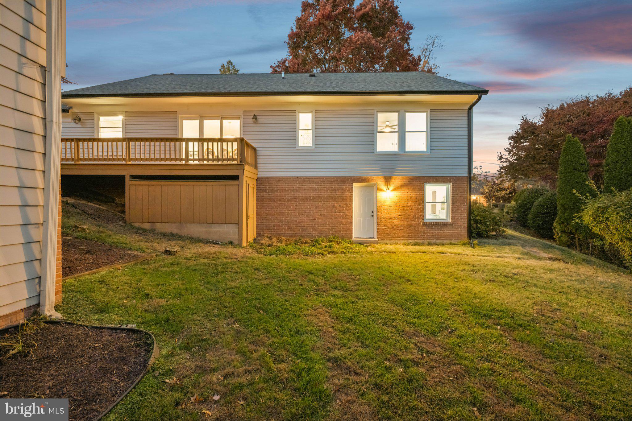 5144 Westpath Way Bethesda, MD 20816 - Photo 40 of 42 a view of a house with a yard