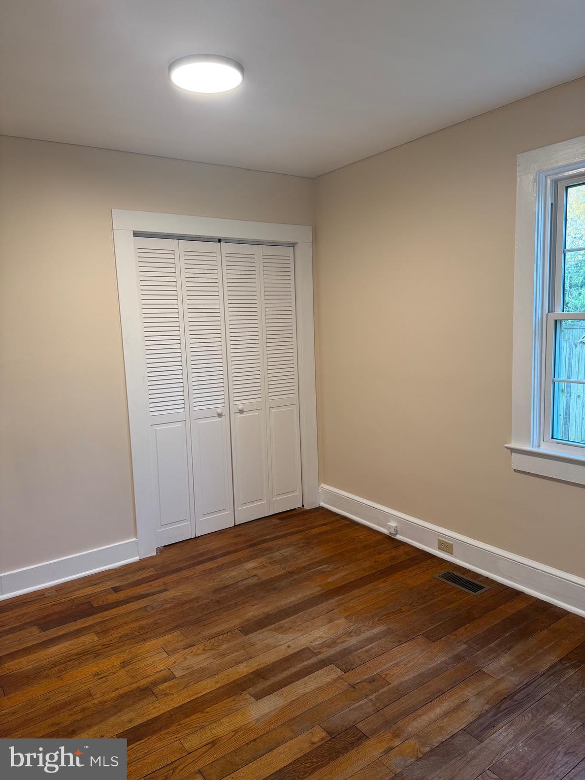 902 Cedar Street Pocomoke City, MD 21851 - Photo 14 of 27 wooden floor in an empty room