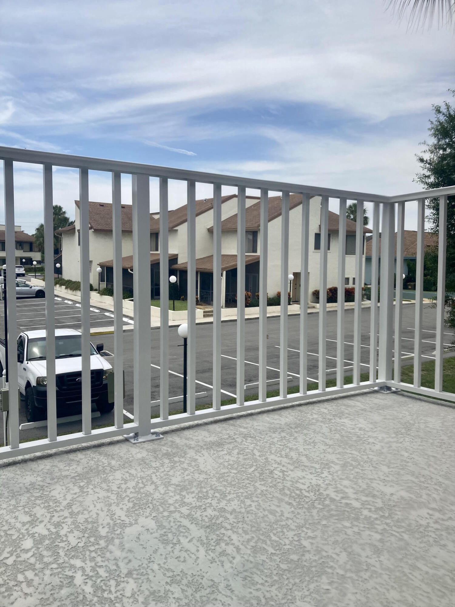 950 South Kanner Highway, Unit D25 Stuart, FL 34994 - Photo 9 of 9 wooden floor in front of building