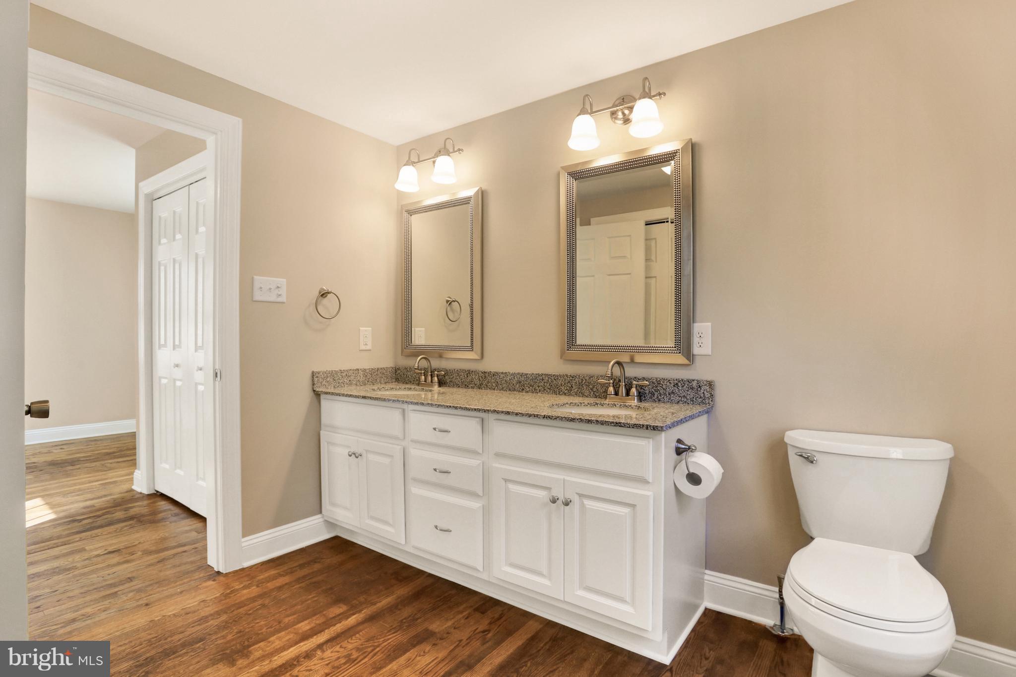 13228 Club Road Hagerstown, MD 21742 - Photo 17 of 28 New master bath w/granite, storage & hw floors