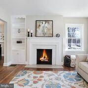 Original fireplace, moldings and built-ins