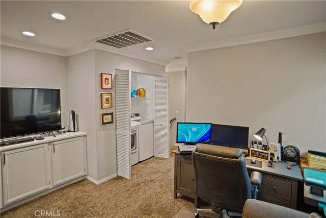 a room with furniture and a flat screen tv