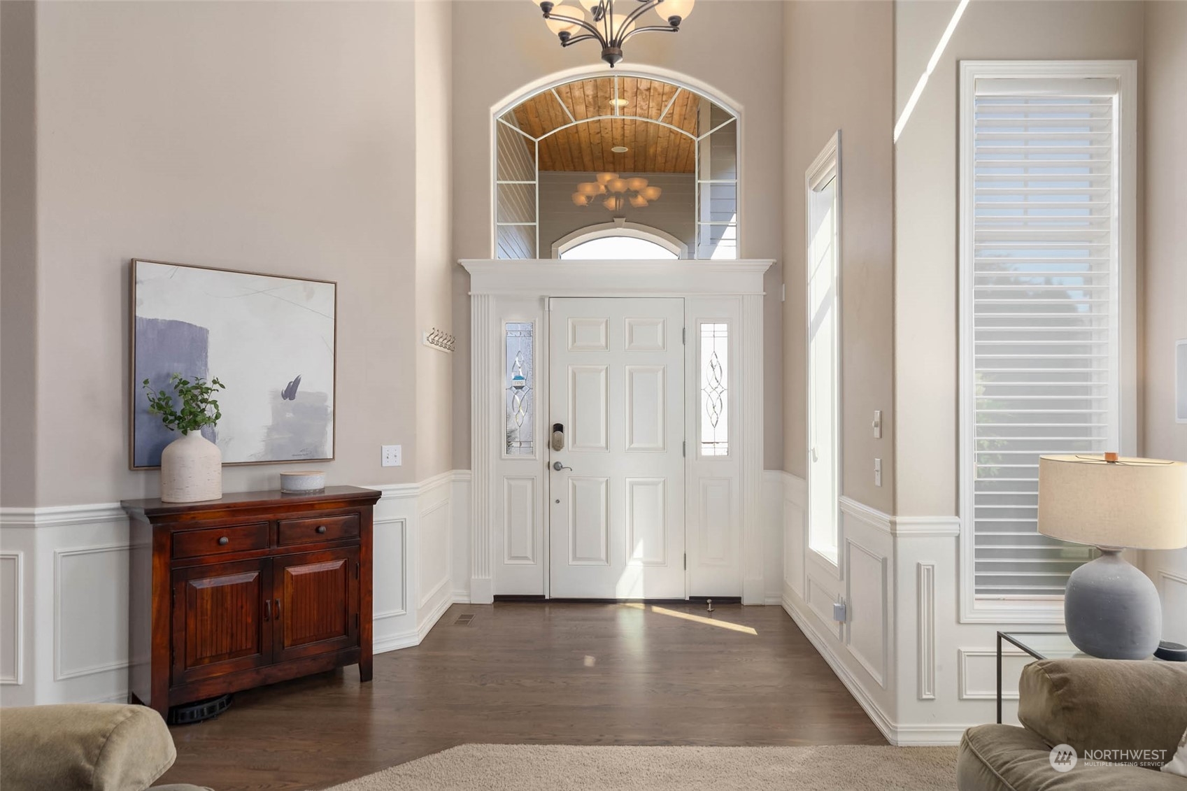3608 214th Place Southeast Bothell, WA 98021 - Photo 20 of 37 a hallway with front door windows and stairs
