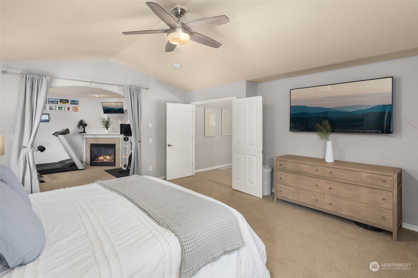 3608 214th Place Southeast Bothell, WA 98021 - Photo 24 of 37 a bedroom with furniture and a flat screen tv