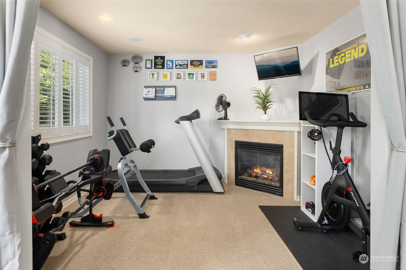 3608 214th Place Southeast Bothell, WA 98021 - Photo 25 of 37 a view of a livingroom with furniture and a flat screen tv
