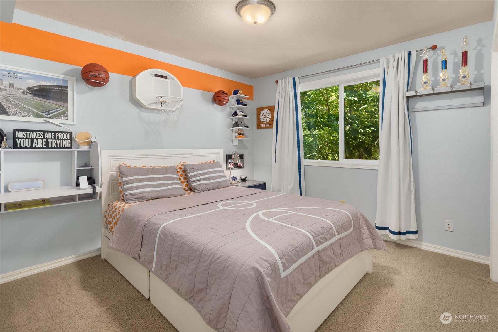 3608 214th Place Southeast Bothell, WA 98021 - Photo 31 of 37 a bedroom with a bed and a large window