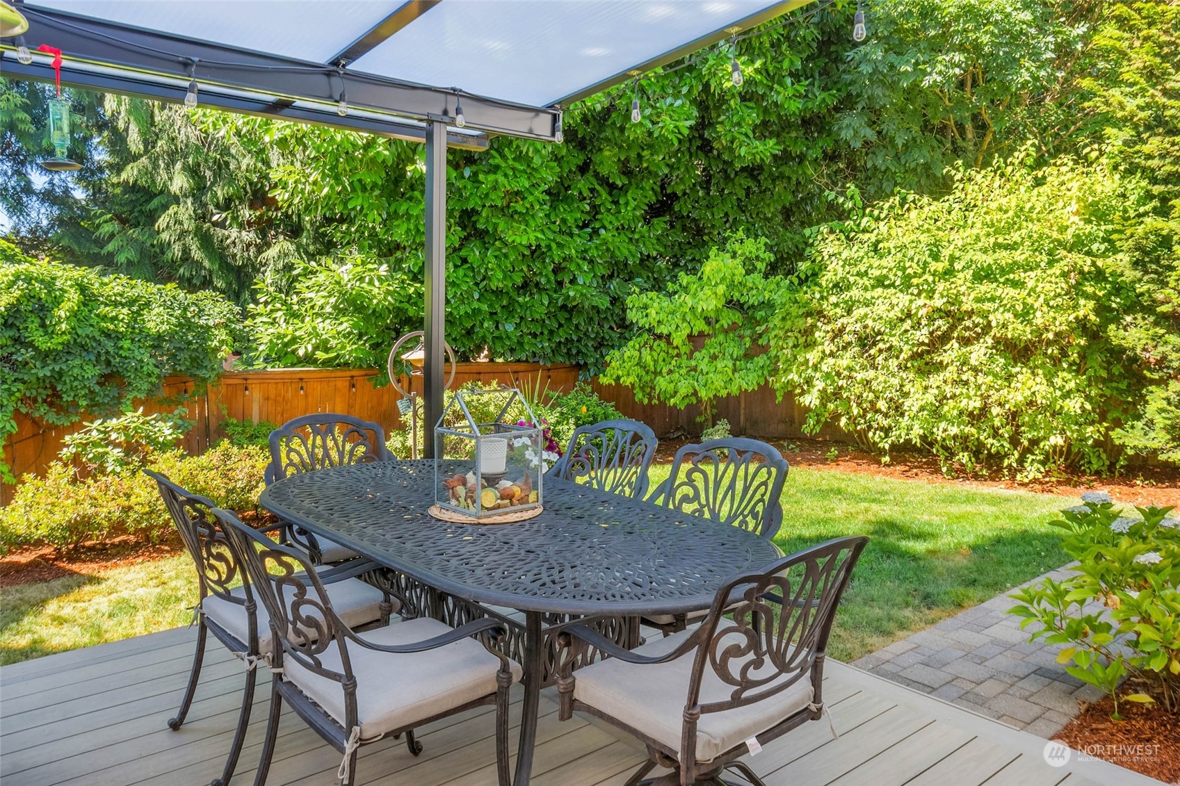 3608 214th Place Southeast Bothell, WA 98021 - Photo 36 of 37 a view of an outdoor dining space with a table and chairs