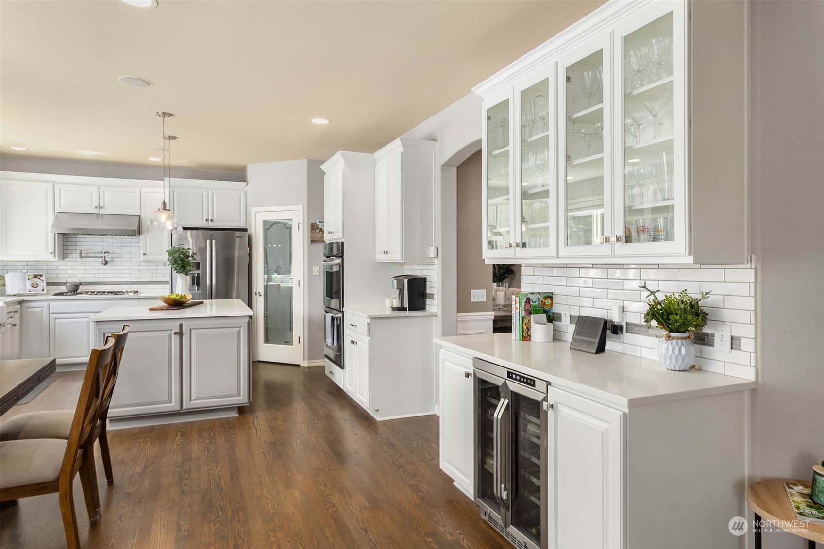 3608 214th Place Southeast Bothell, WA 98021 - Photo 7 of 37 a kitchen with white cabinets and appliances