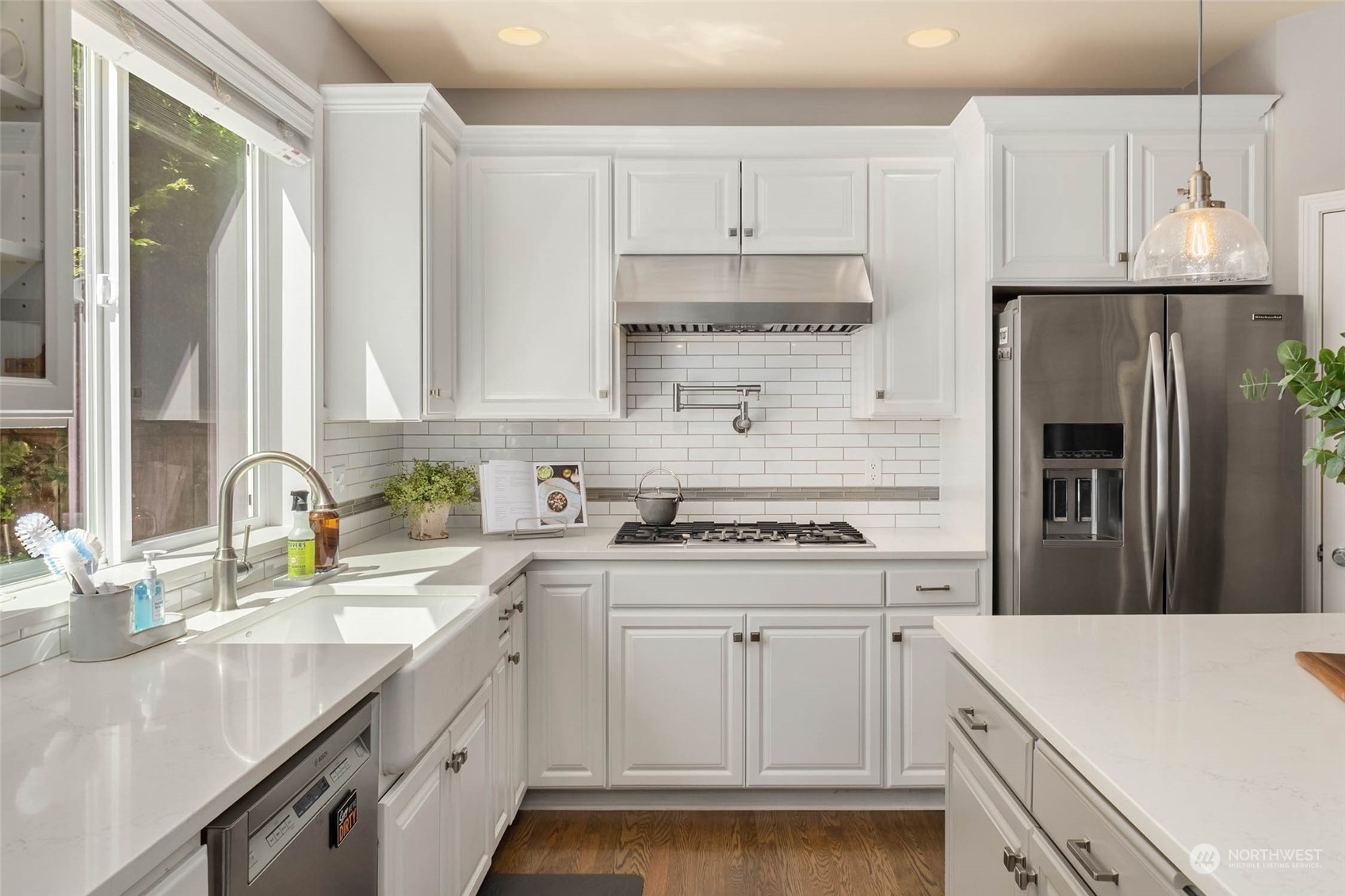 3608 214th Place Southeast Bothell, WA 98021 - Photo 8 of 37 a kitchen with stainless steel appliances granite countertop a sink stove and refrigerator