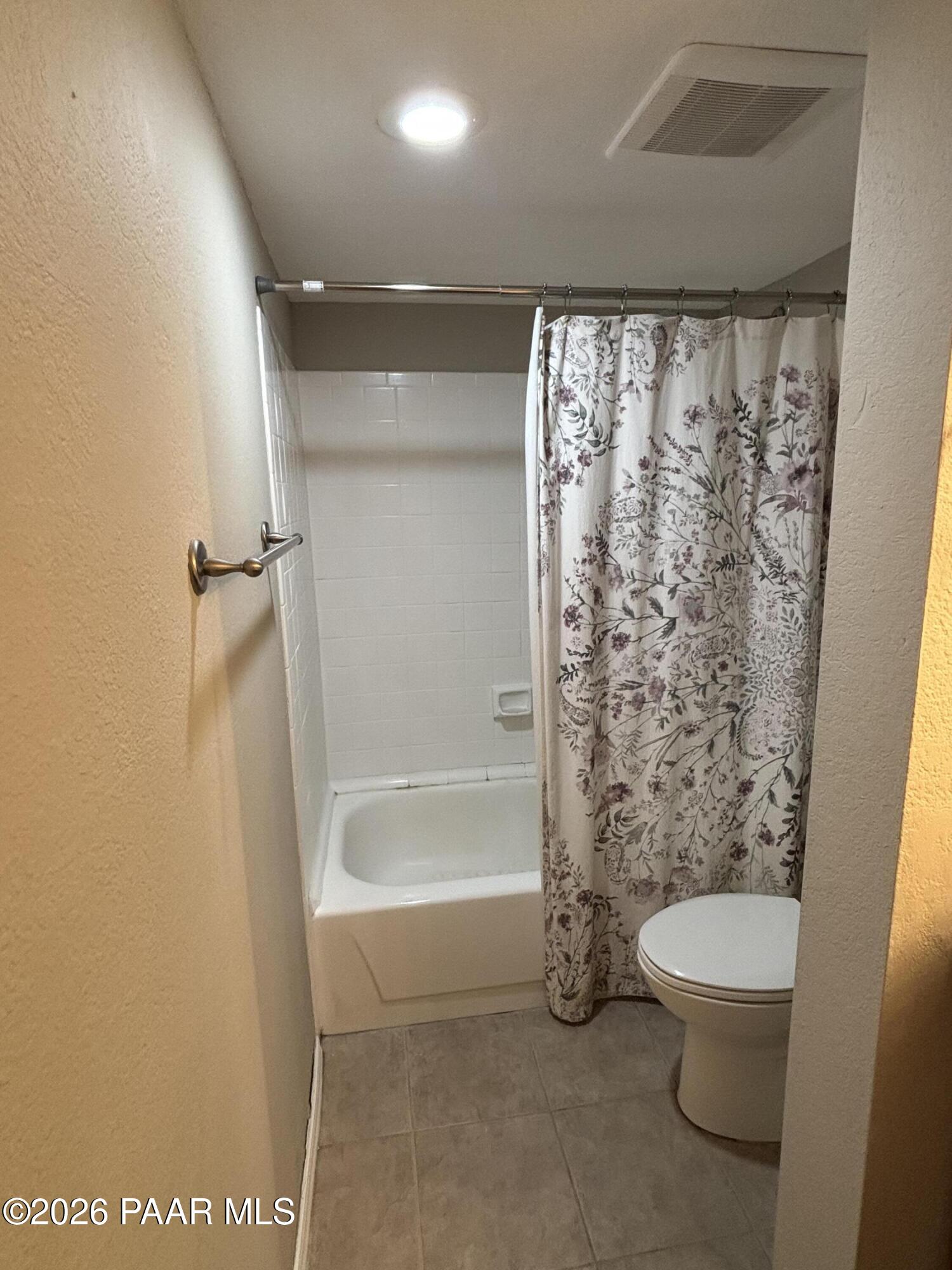 8787 East Mountain View Road, Unit 1082 Scottsdale, AZ 85258 - Photo 22 of 46 a bathroom with a toilet and a shower