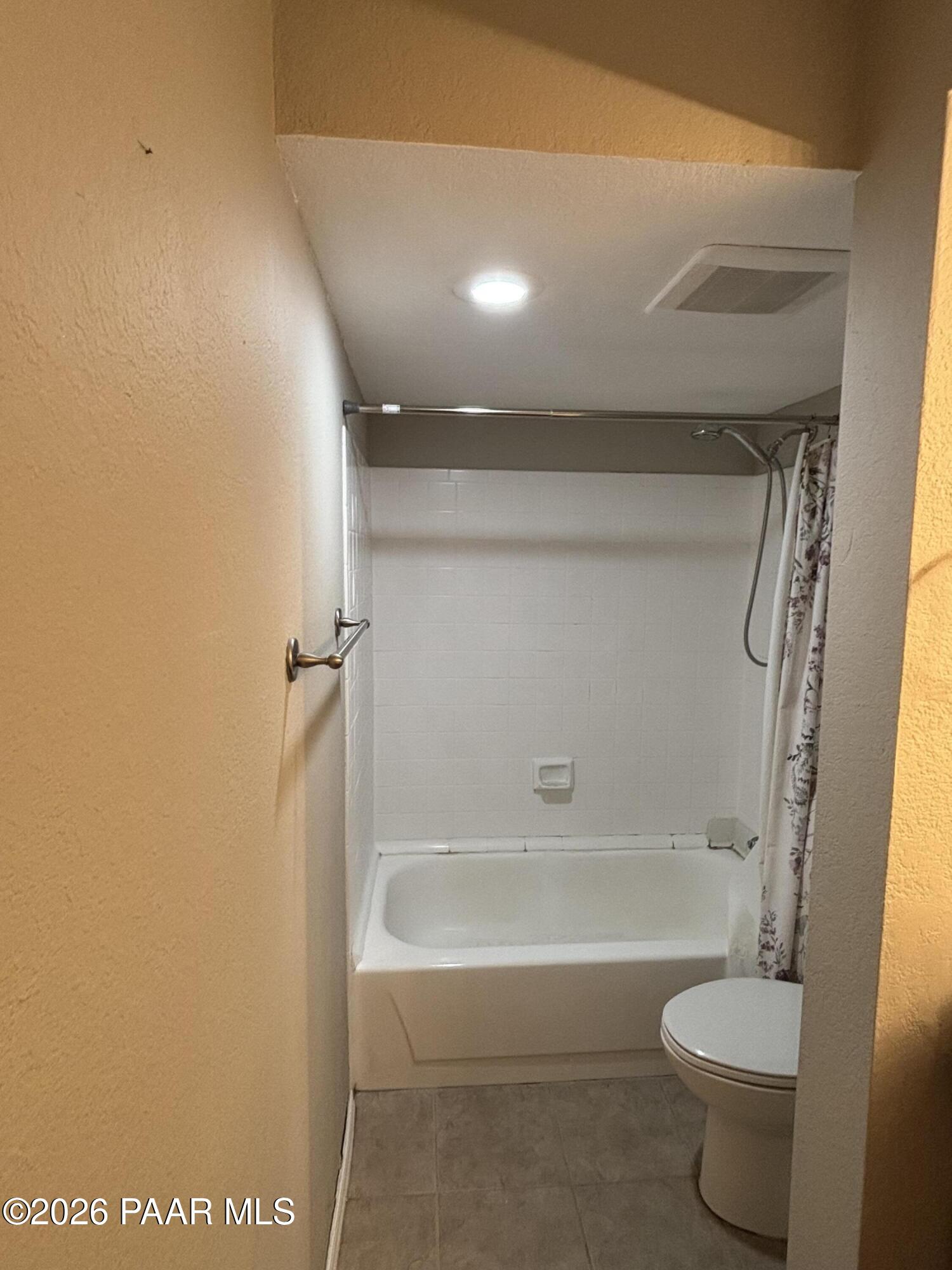 8787 East Mountain View Road, Unit 1082 Scottsdale, AZ 85258 - Photo 25 of 46 a bathroom with a shower and a toilet