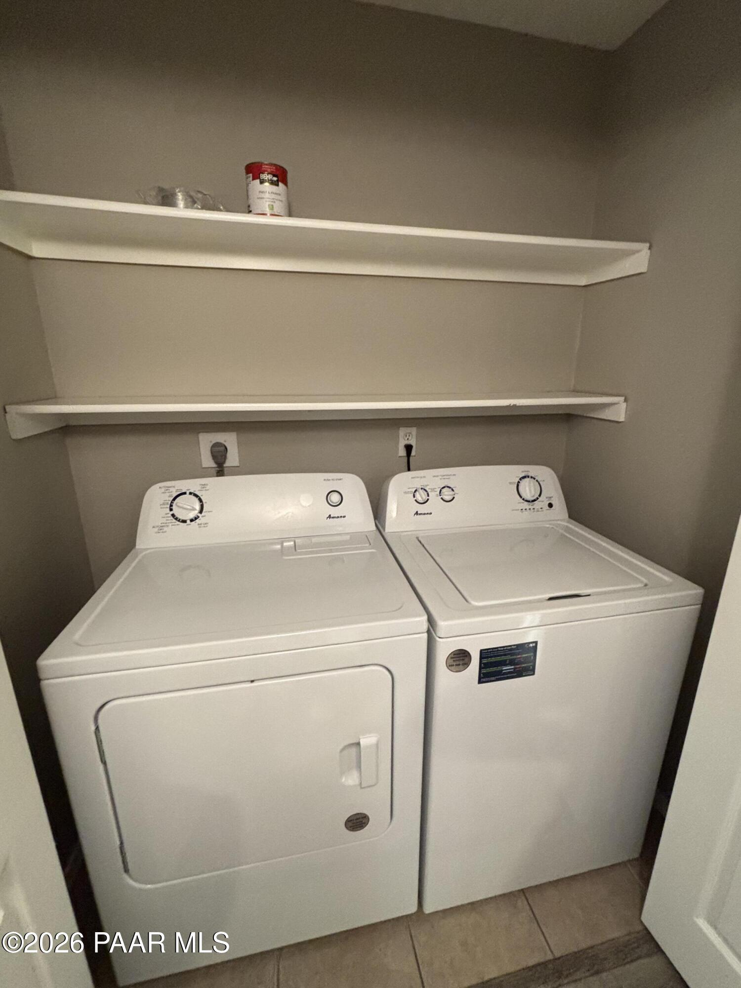 8787 East Mountain View Road, Unit 1082 Scottsdale, AZ 85258 - Photo 28 of 46 a utility room with dryer and washer