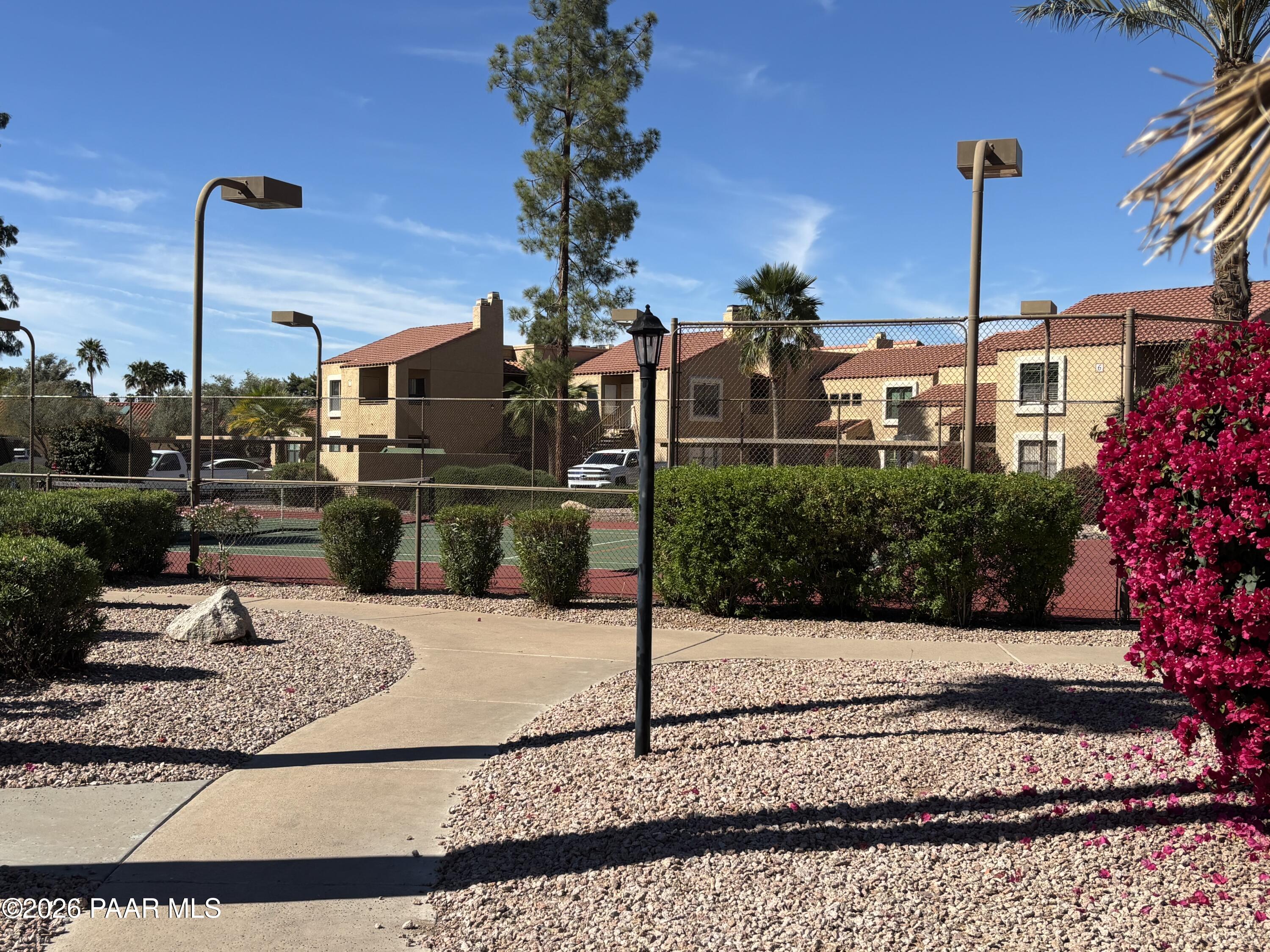 8787 East Mountain View Road, Unit 1082 Scottsdale, AZ 85258 - Photo 31 of 46 a view of a house with a street