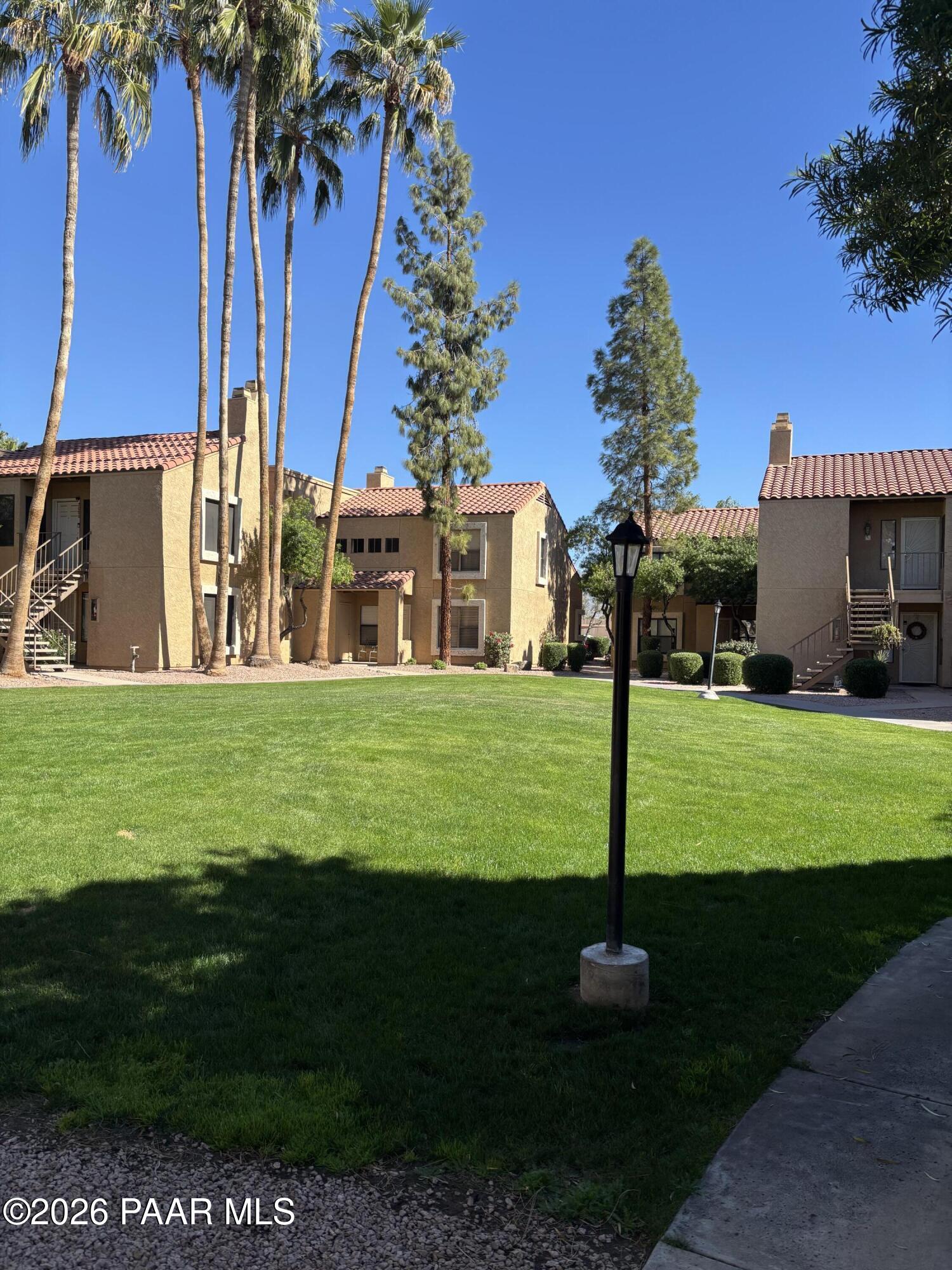 8787 East Mountain View Road, Unit 1082 Scottsdale, AZ 85258 - Photo 39 of 46 a view of a park with palm trees