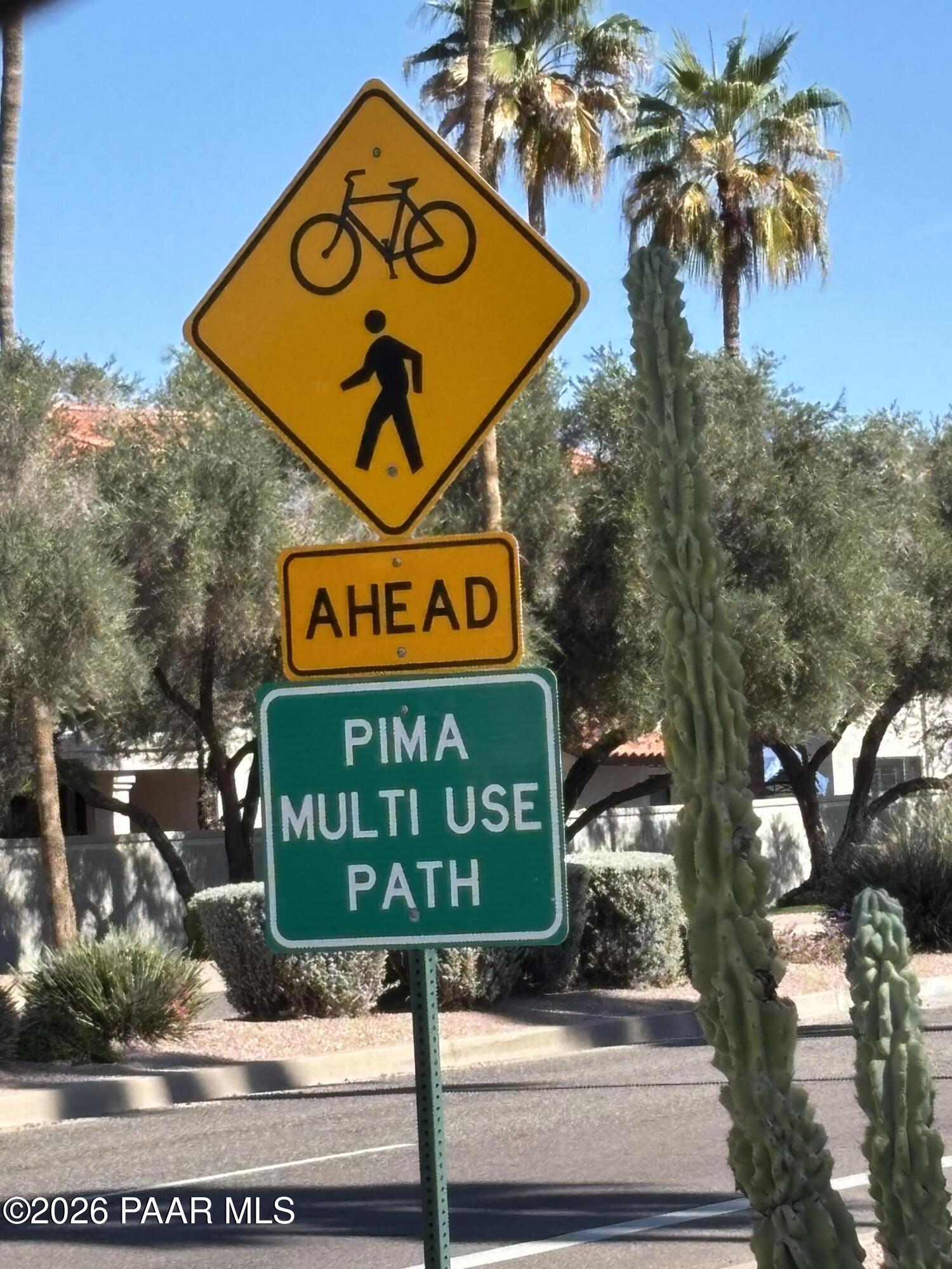 8787 East Mountain View Road, Unit 1082 Scottsdale, AZ 85258 - Photo 4 of 46 a sign that is on a pole