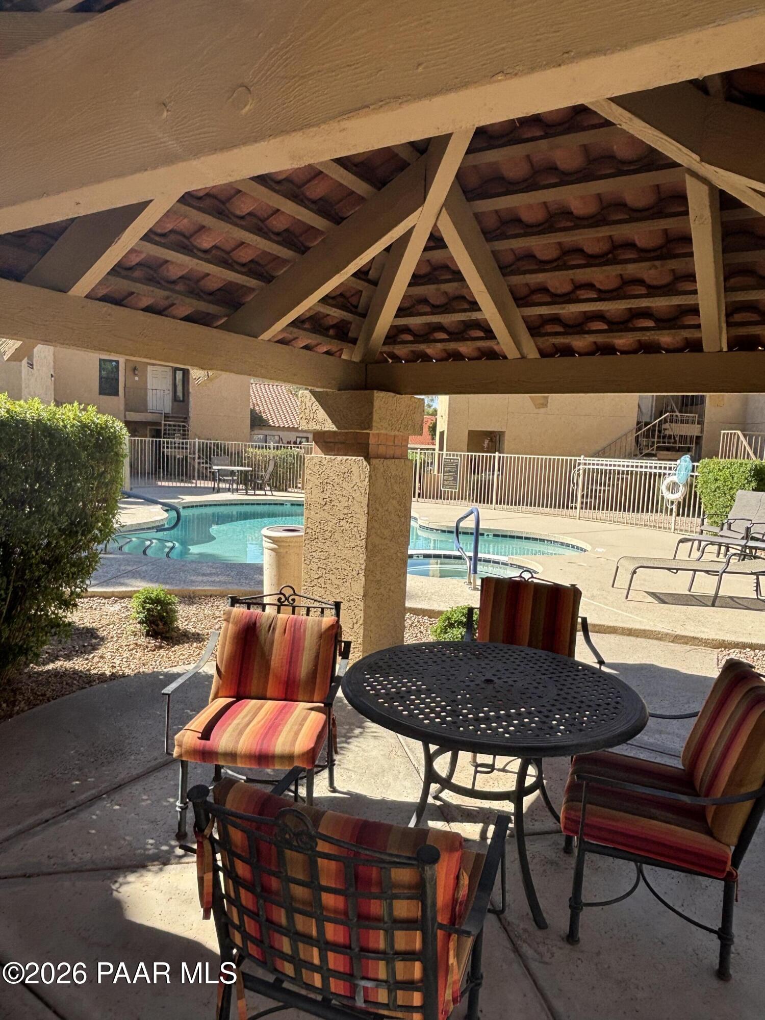 8787 East Mountain View Road, Unit 1082 Scottsdale, AZ 85258 - Photo 43 of 46 a outdoor view with a sitting space