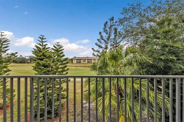 a view of a balcony with an outdoor space