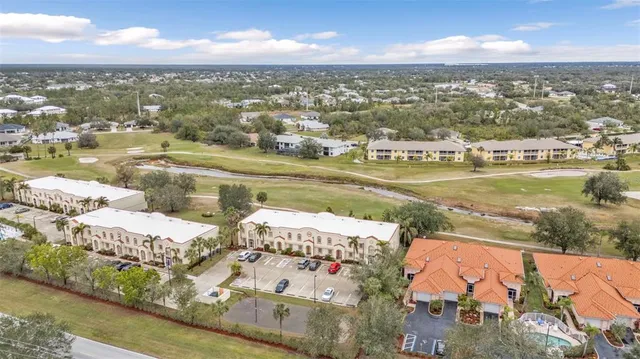 a view of a city with an ocean view