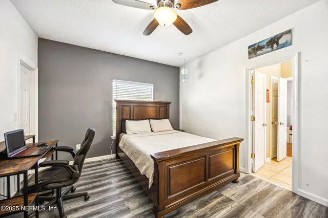 a bed room with a bed and a couch