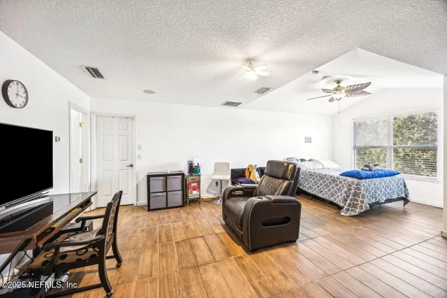 a room with furniture and a window