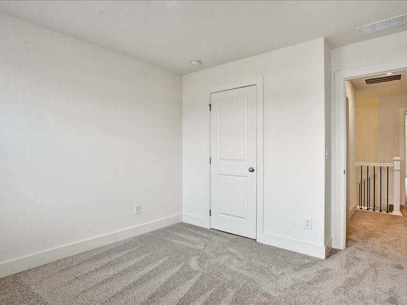 2539 Riverside Court Northeast Conyers, GA 30013 - Photo 11 of 31 a view of an empty room
