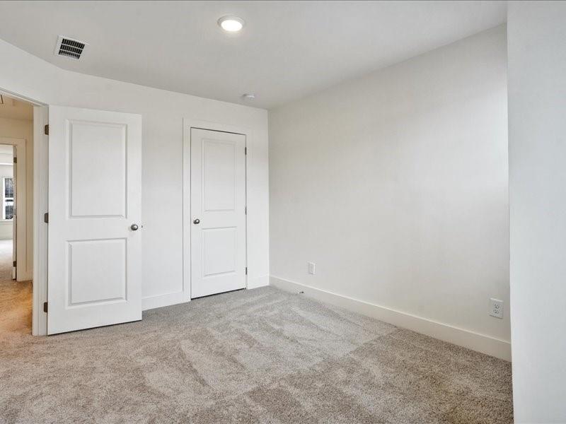 2539 Riverside Court Northeast Conyers, GA 30013 - Photo 13 of 31 a view of an empty room