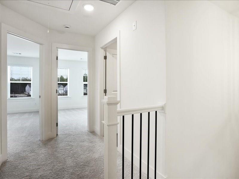 2539 Riverside Court Northeast Conyers, GA 30013 - Photo 18 of 31 a view of a hallway with wooden floor