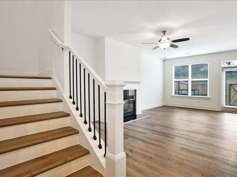 2539 Riverside Court Northeast Conyers, GA 30013 - Photo 5 of 31 wooden floor in an empty room with a window