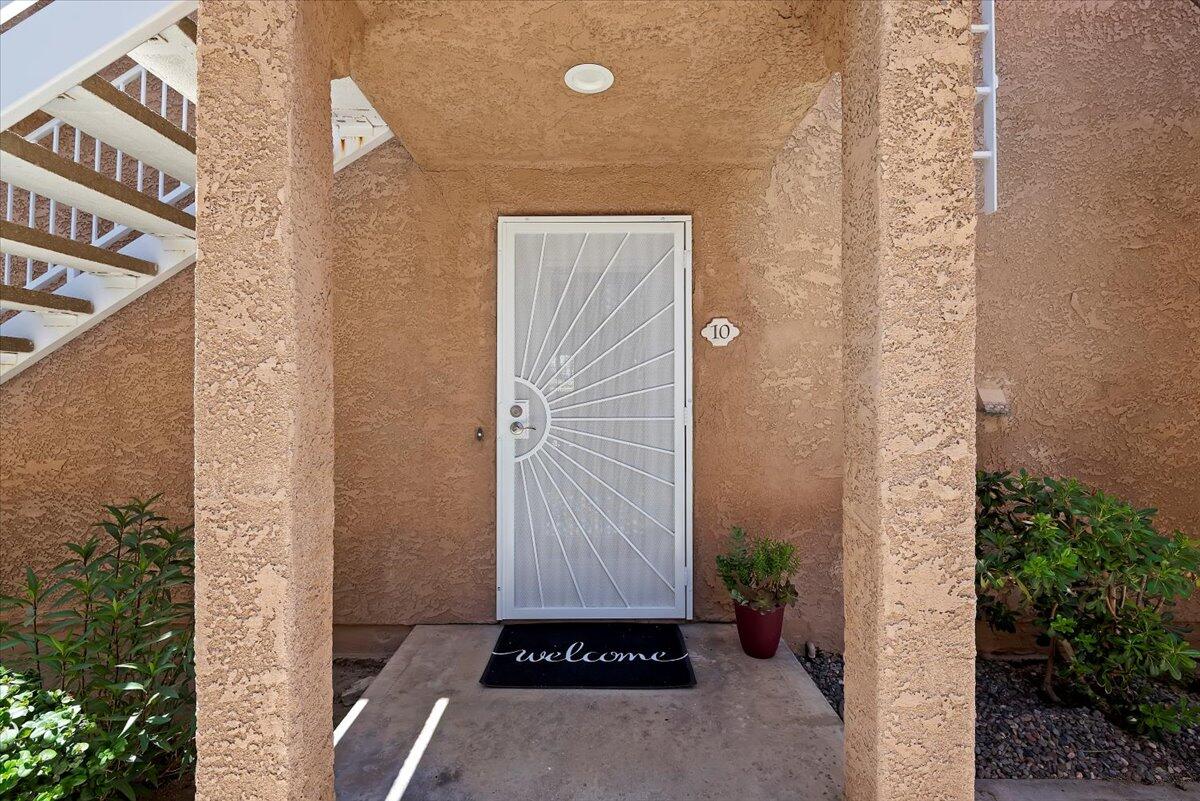 2700 Lawrence Crossley Road, Unit 10 Palm Springs, CA 92264 - Photo 15 of 15 a view of a door and a yard