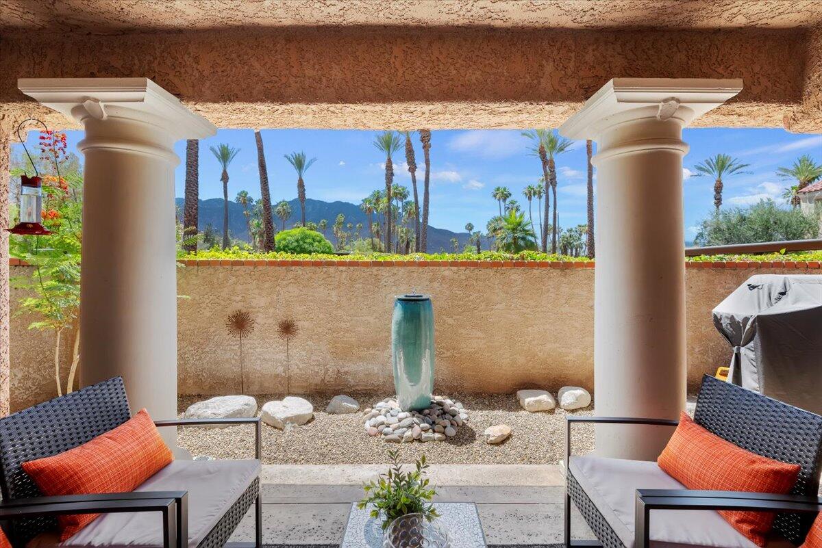 2700 Lawrence Crossley Road, Unit 10 Palm Springs, CA 92264 - Photo 4 of 15 a outdoor dining space with furniture