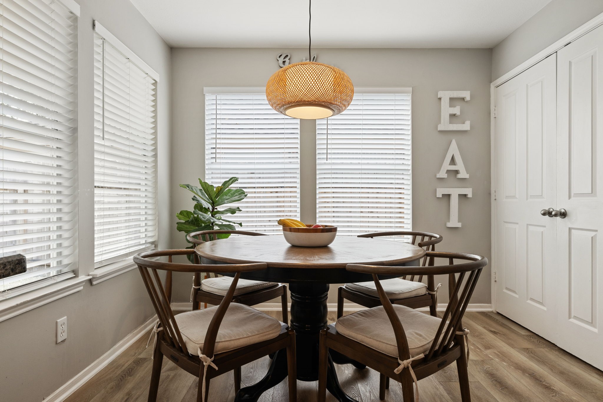 2106 Lexington Woods Drive Spring, TX 77373 - Photo 12 of 27 a view of a dining room with furniture and wooden floor