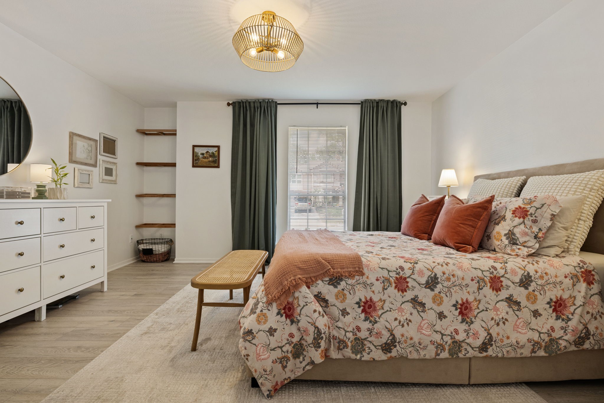 2106 Lexington Woods Drive Spring, TX 77373 - Photo 15 of 27 a bedroom with a bed and a cabinets