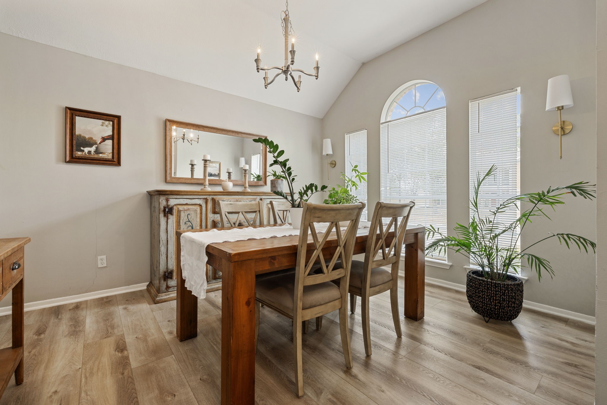 2106 Lexington Woods Drive Spring, TX 77373 - Photo 5 of 27 a view of a dining room with furniture and wooden floor