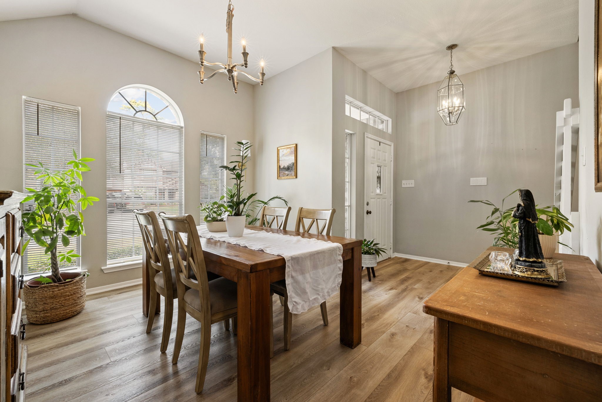 2106 Lexington Woods Drive Spring, TX 77373 - Photo 6 of 27 a view of a dining room with furniture window and wooden floor
