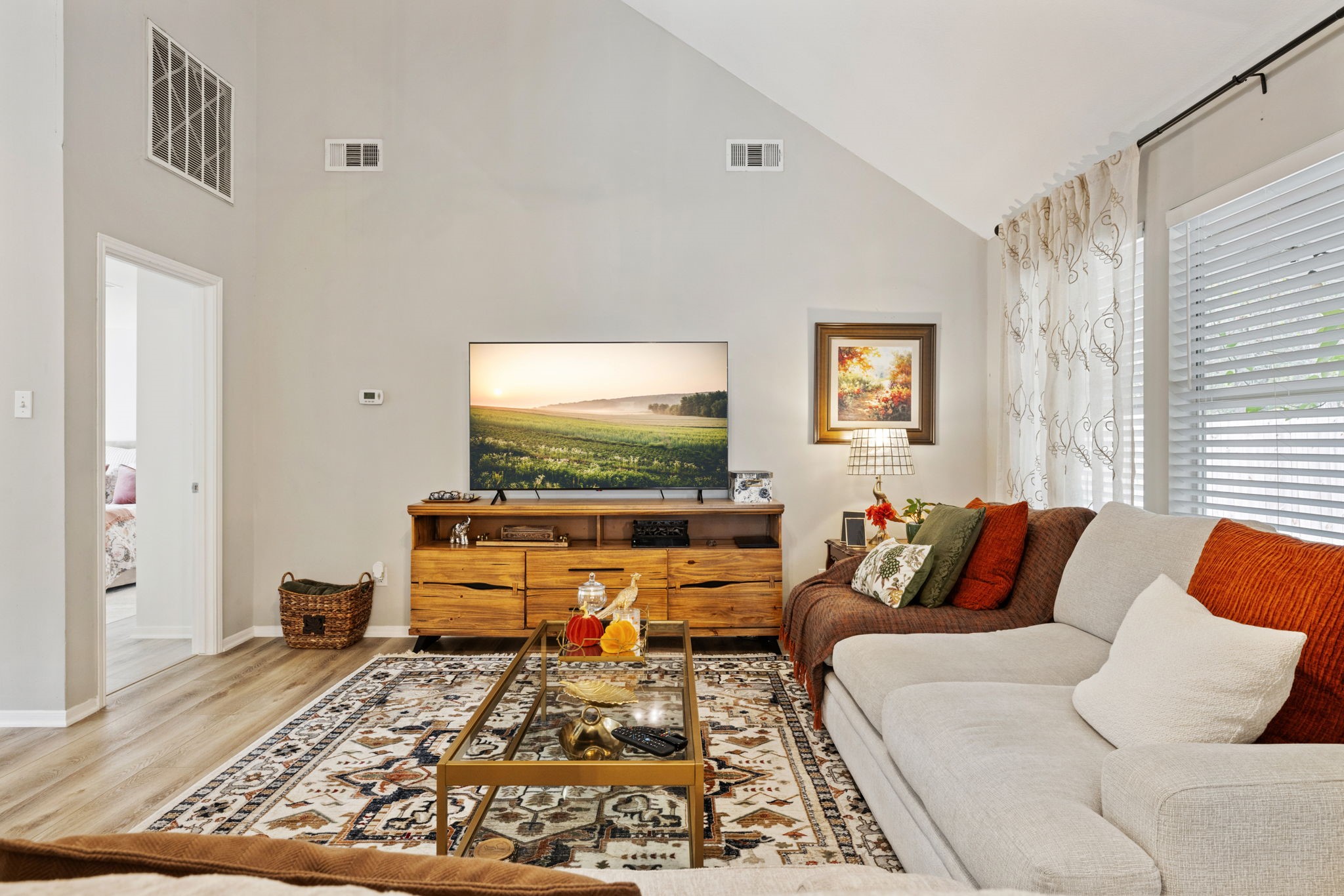 2106 Lexington Woods Drive Spring, TX 77373 - Photo 8 of 27 a living room with furniture and a flat screen tv