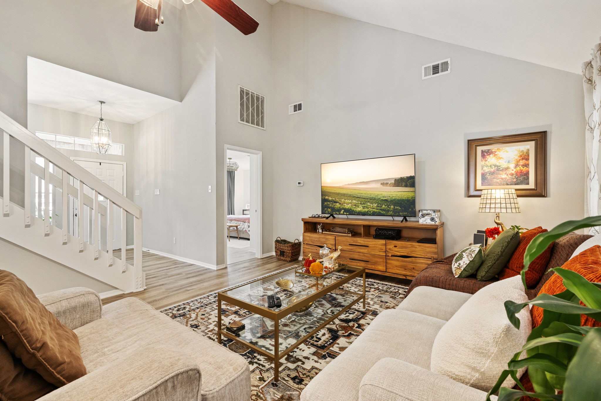 2106 Lexington Woods Drive Spring, TX 77373 - Photo 9 of 27 a living room with furniture and a flat screen tv