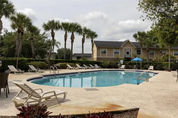 a view of a house with a swimming pool