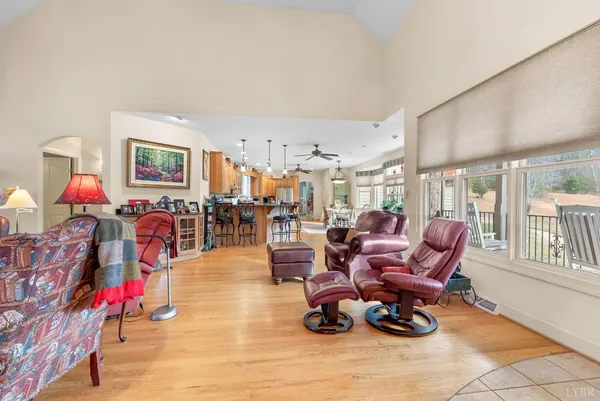 a living room filled with furniture and a table