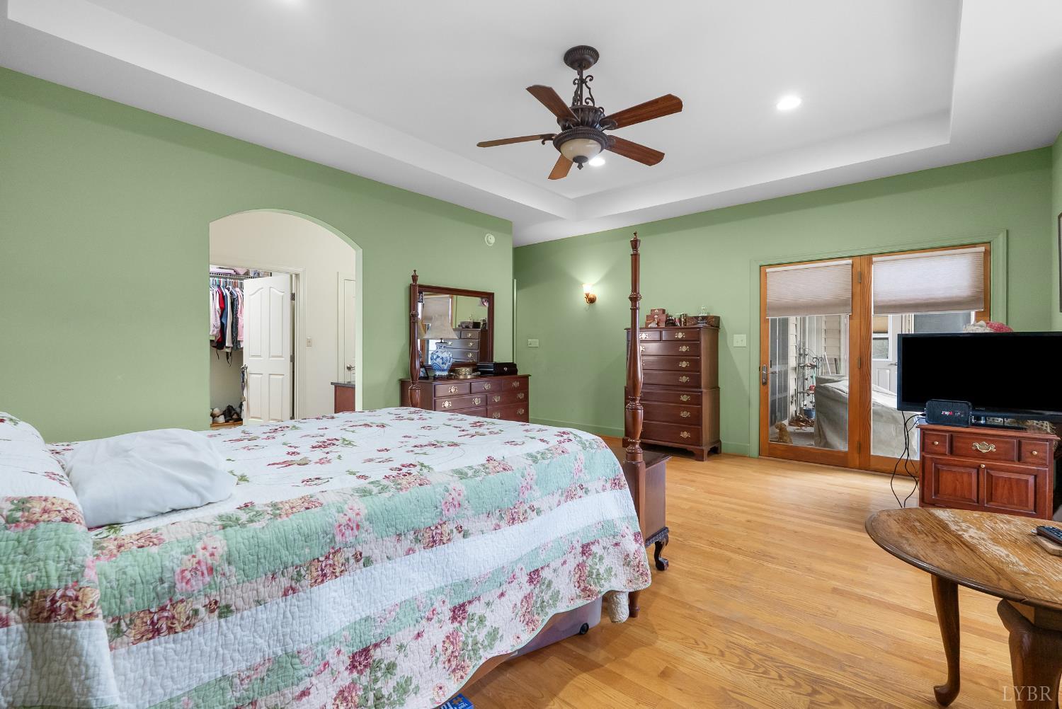 2481 School Crossing Road Lynch Station, VA 24571 - Photo 19 of 47 a bedroom with a bed and a flat screen tv