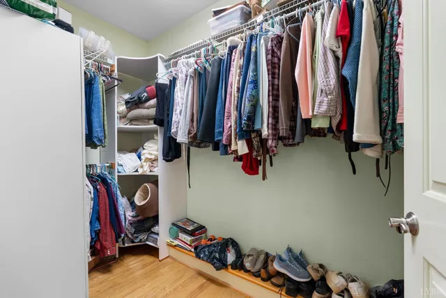 a bedroom with a bed and furniture