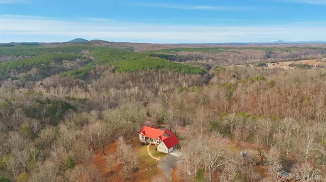 a view of a field with an ocean
